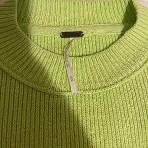 lime green. free people oversized sweater. dry cleaned only. great condition.